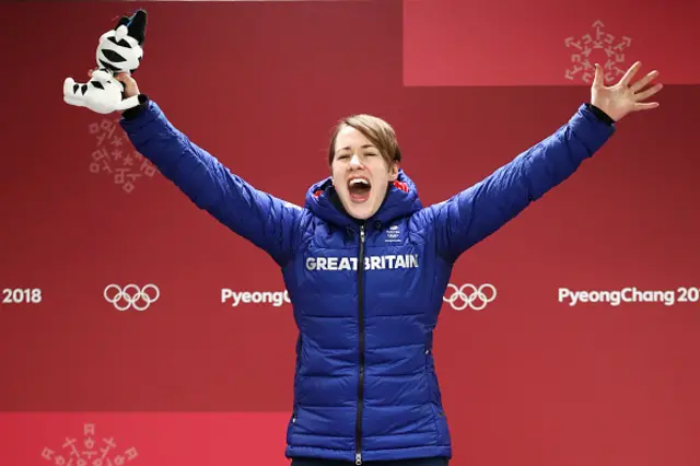 Lizzie Yarnold celebrates