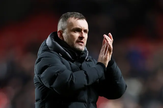 Nathan Jones clapping