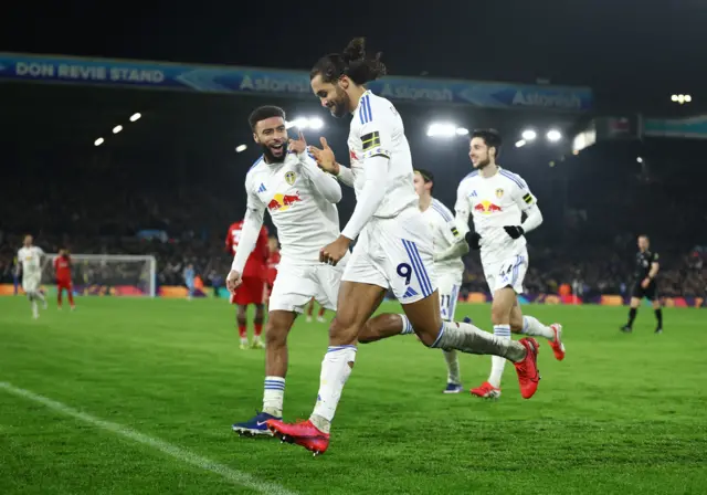 Leeds players run to celebrate