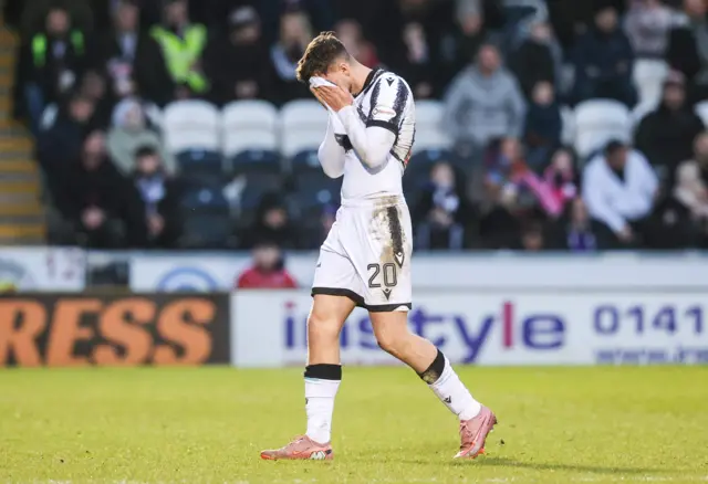 Young trudges off after his red card against Dundee