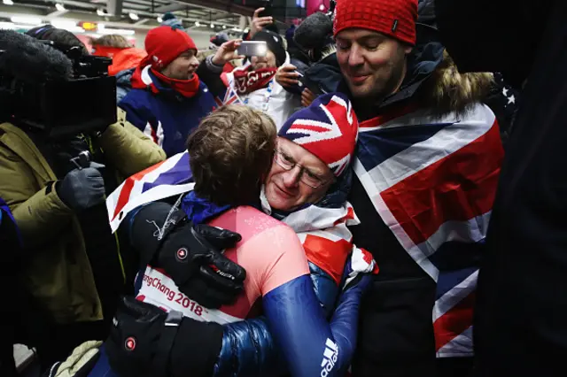 Lizzie Yarnold celebrates