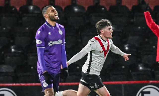 Euan Henderson celebrates his equaliser