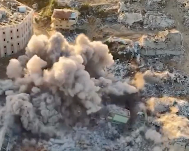 A screengrab taken from what appears to be a drone video of the explosion at the school in Gaza