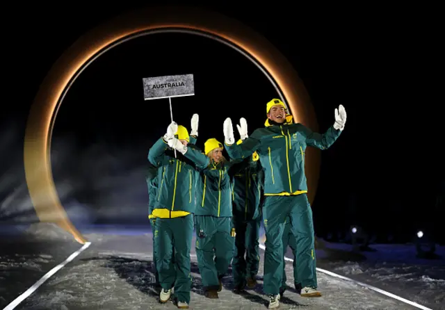 Athletes of Team Australia enter the stadium