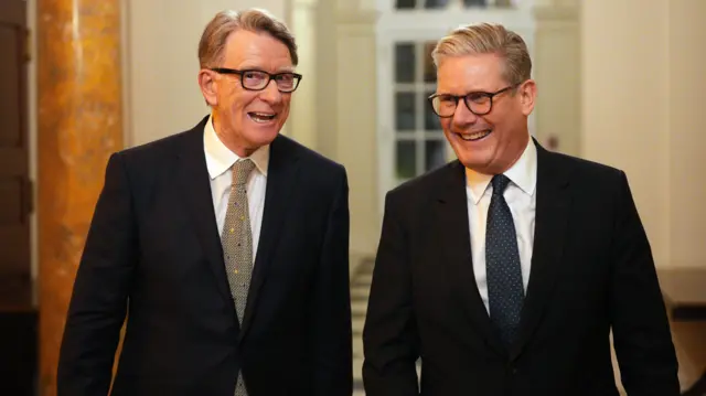 Mandelson (L) pictured with Starmer before being sacked from his ambassador role last September