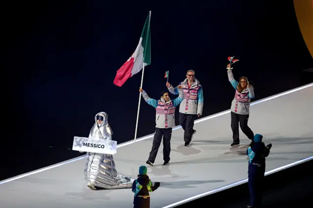 Flagbearer Donovan Carrillo of Team Mexico enters with the team