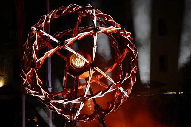 The Olympic cauldron at the Angelo Dibona Square is seen during the opening ceremony
