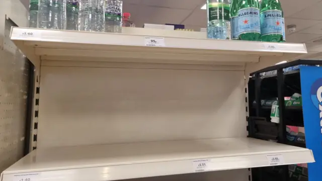 Empty shelves in a supermarket