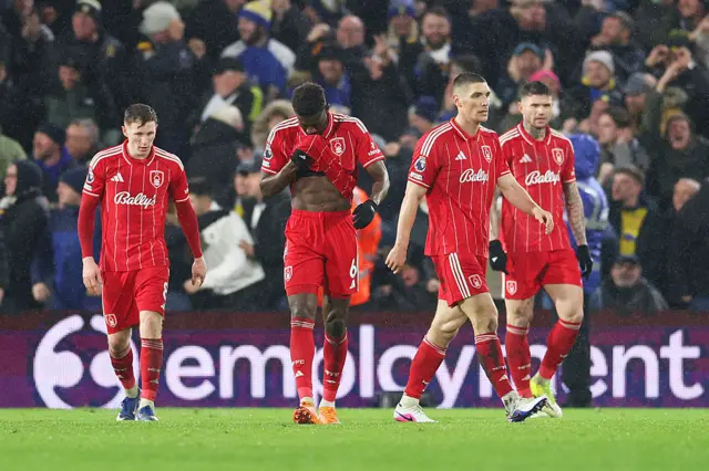 Forest players trudge back to kick off