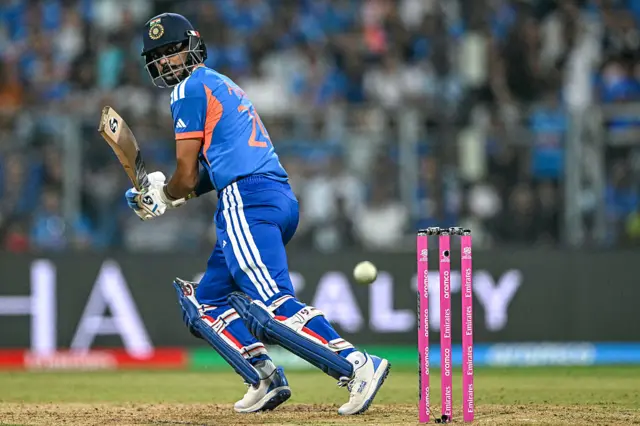 India's Axar Patel watches the ball after playing a shot