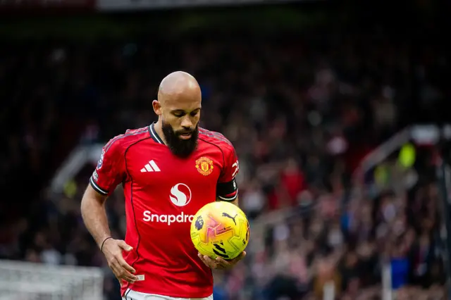 Bryan Mbuemo holding the ball