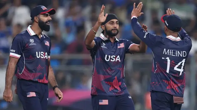 Harmeet Singh of the United States celebrates the wicket of Hardik Pandya of India