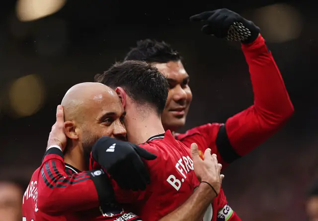 Bryan Mbuemo, Bruno Fernandes and Casemiro celebrate