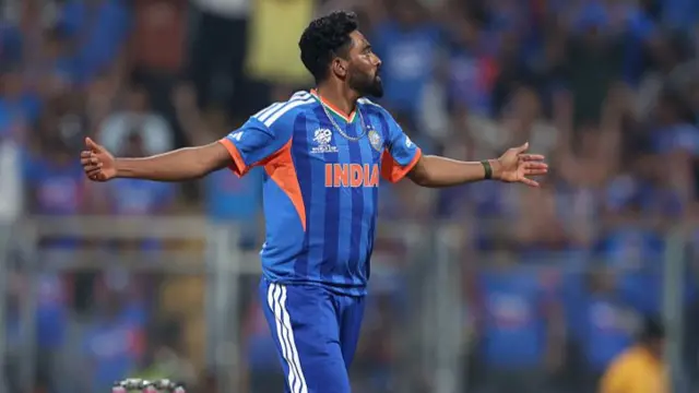 Mohammed Siraj of India celebrates the wicket of Andries Gous