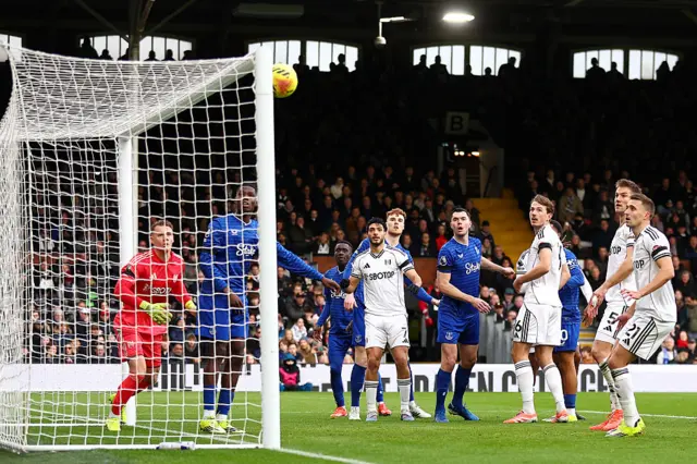 A shot crashes back off the post