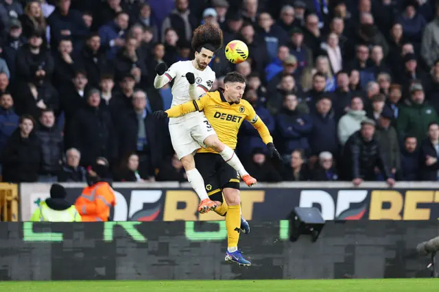 Marc Cucurella battles with Matt Doherty