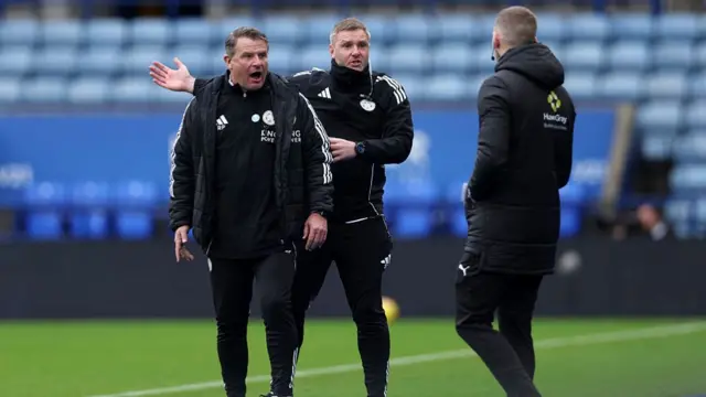 Rick Passmoor protests to the fourth official