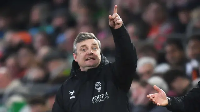 Michael Skubala pointing upwards