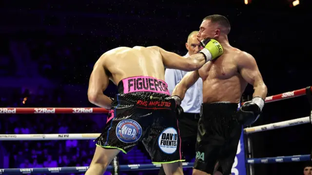 Figueroa punches Nick Ball