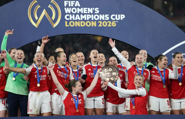 Arsenal lift the Champions Cup trophy