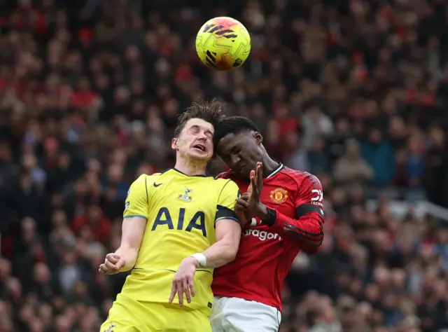 Mainoo wins a header above Gallagher