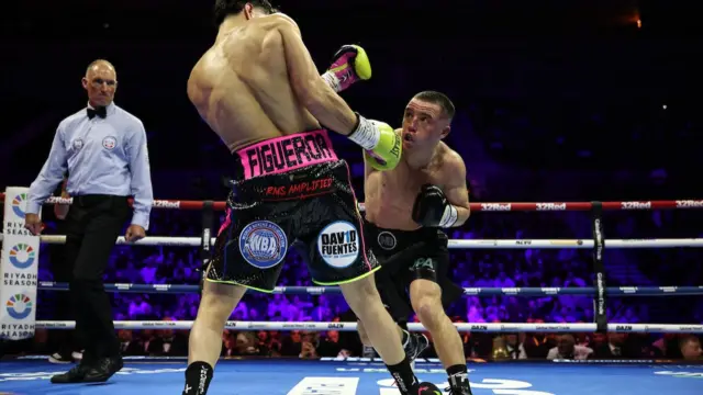 Nick Ball throws a punch