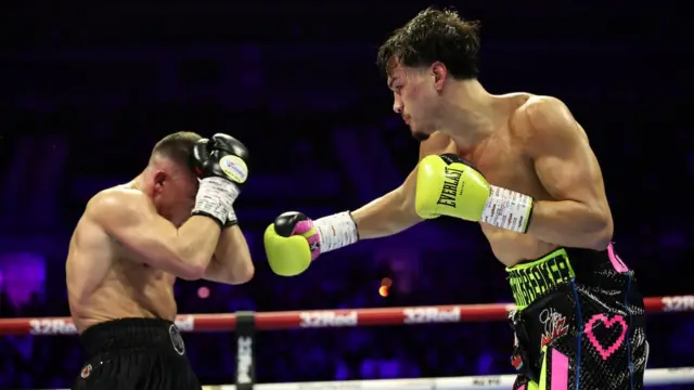 Brandon Figueroa punches Nick Ball