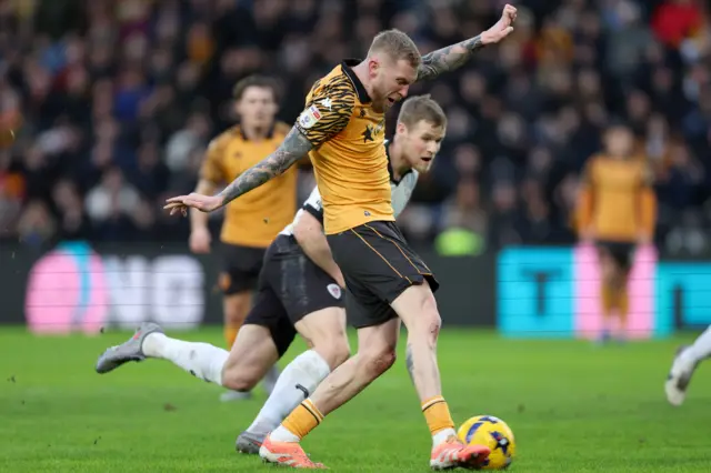 Hull City's Oliver McBurnie scores