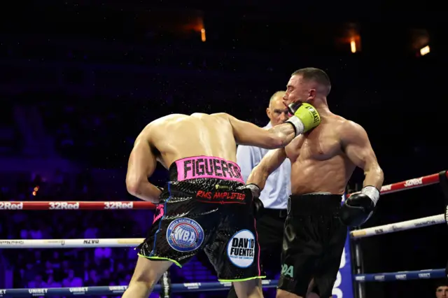 Brandon Figueroa punches Nick Ball