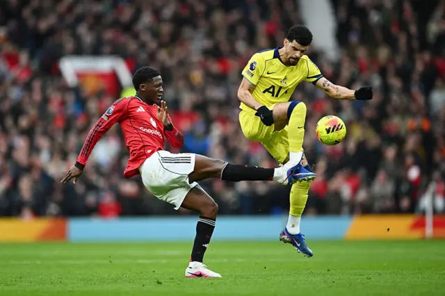 Dominic Solanke battles with Kobbie Mainoo