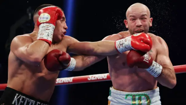 Nick Ball punches TJ Doheny