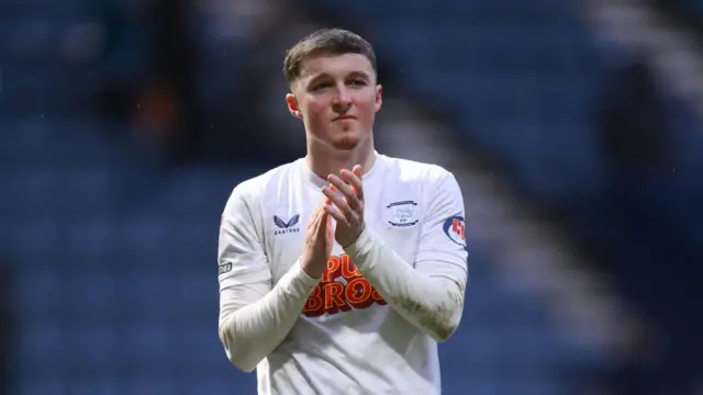 Preston North End's Alfie Devine applauds the fans