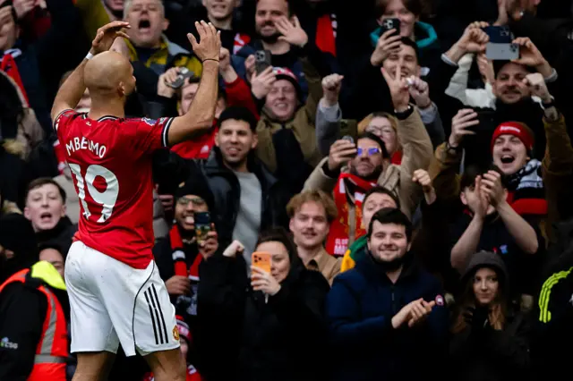 Mbeumo celebrates with the fans