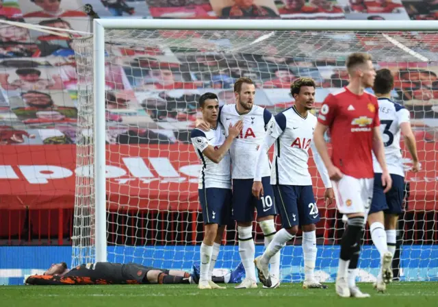 Spurs players celebrate one of Kane's goals in the 2020 meeting with United