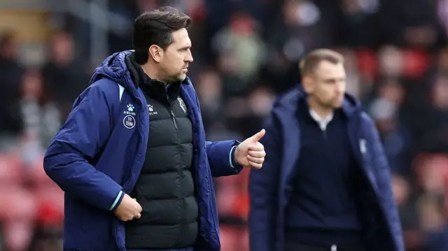 Watford caretaker manager Charlie Daniels (left) gestures on the touchline