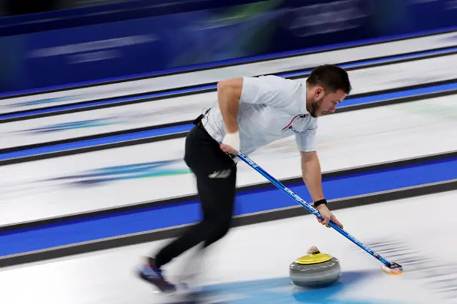 Korey Dropkin of Team United States competes with Cory Thiesse of Team United States