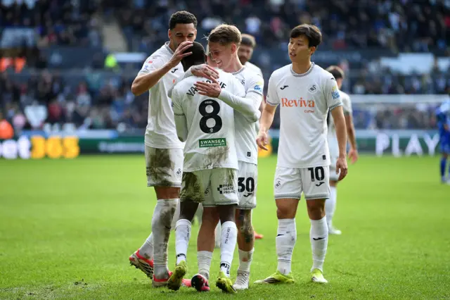 Swansea City players celebrate Malick Yalcouye's goal