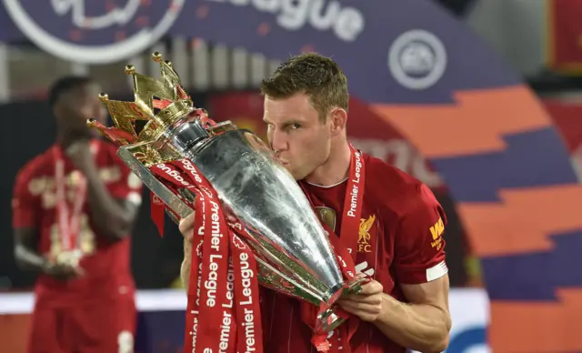 James Milner kissing Premier League trophy