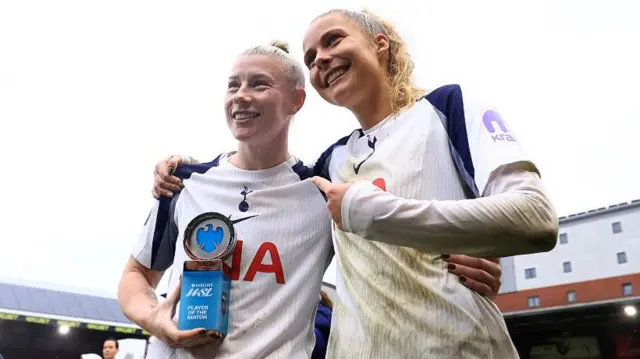 Bethany England of Tottenham Hotspur poses for a photo with her Barclays Women's Super League Player of the Match award with teammate Olivia Holdt