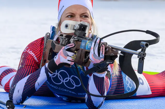 Austria's Lisa Theresa Hauser aims at the shooting range in the mixed biathlon 4 x 6km relay event