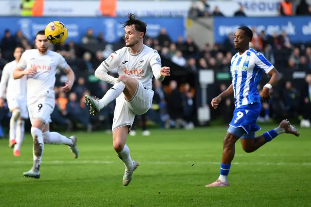 Swansea City's Liam Cullen has an effort on goal