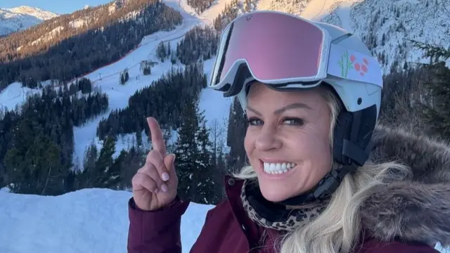 Chemmy Alcott doing a course inspection before women's downhill