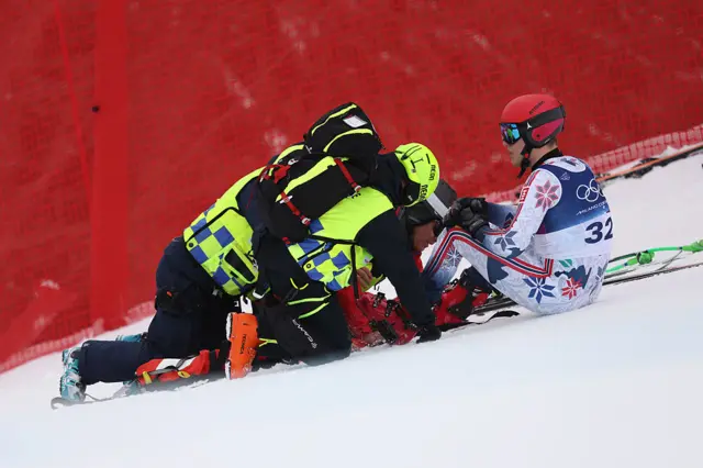 Fredrik Moeller of Team Norway is tended to by medics