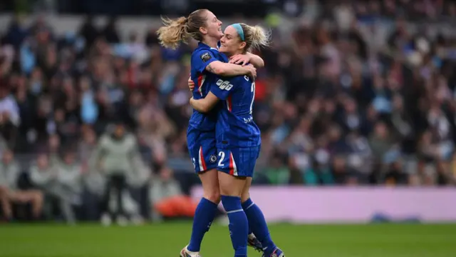 Keira Walsh celebrates with Ellie Carpenter