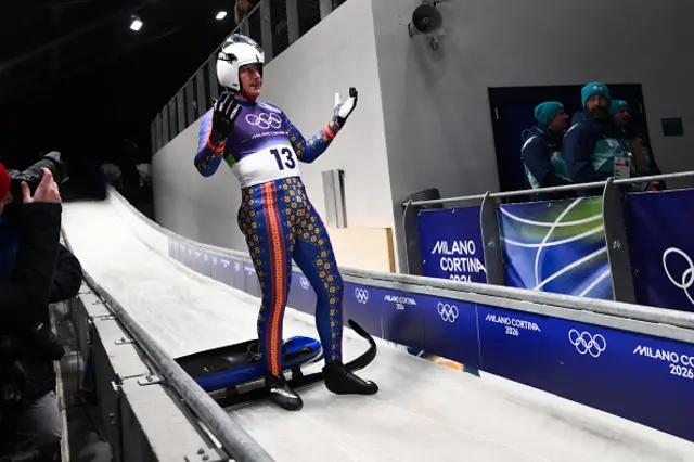 Romania's Valentin Cretu reacts in the finish area after competing