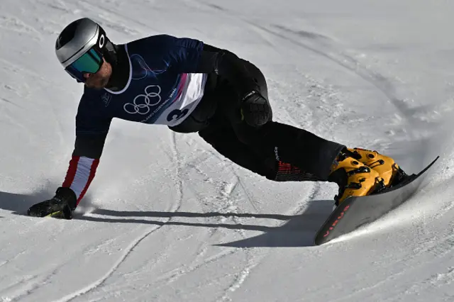 Austria's Benjamin Karl competes in the snowboard men's parallel giant slalom