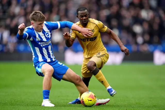 Brighton and Hove Albion’s Harry Howell, (left) battle for the ball with Crystal Palace's Tyrick Mitchell during the Premier League match at the American Express Stadium, Brighton and Hove.
