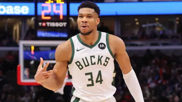Giannis Antetokounmpo of the Milwaukee Bucks celebrates a three pointer against the Chicago Bulls
