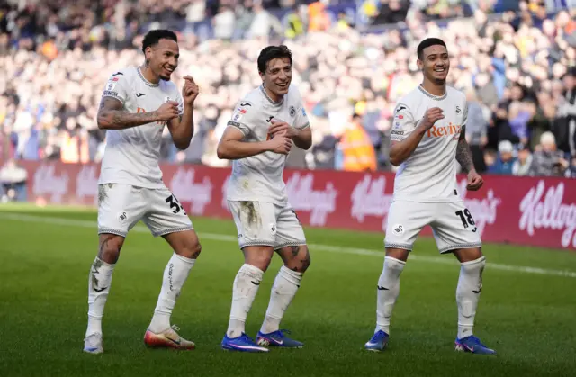 Swansea City's Ronald (left) celebrates with Goncalo Franco (centre) and Gustavo Nunes (right)
