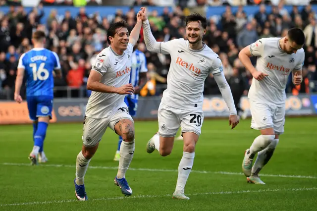Swansea City's Goncalo Franco (left) celebrates with Liam Cullen